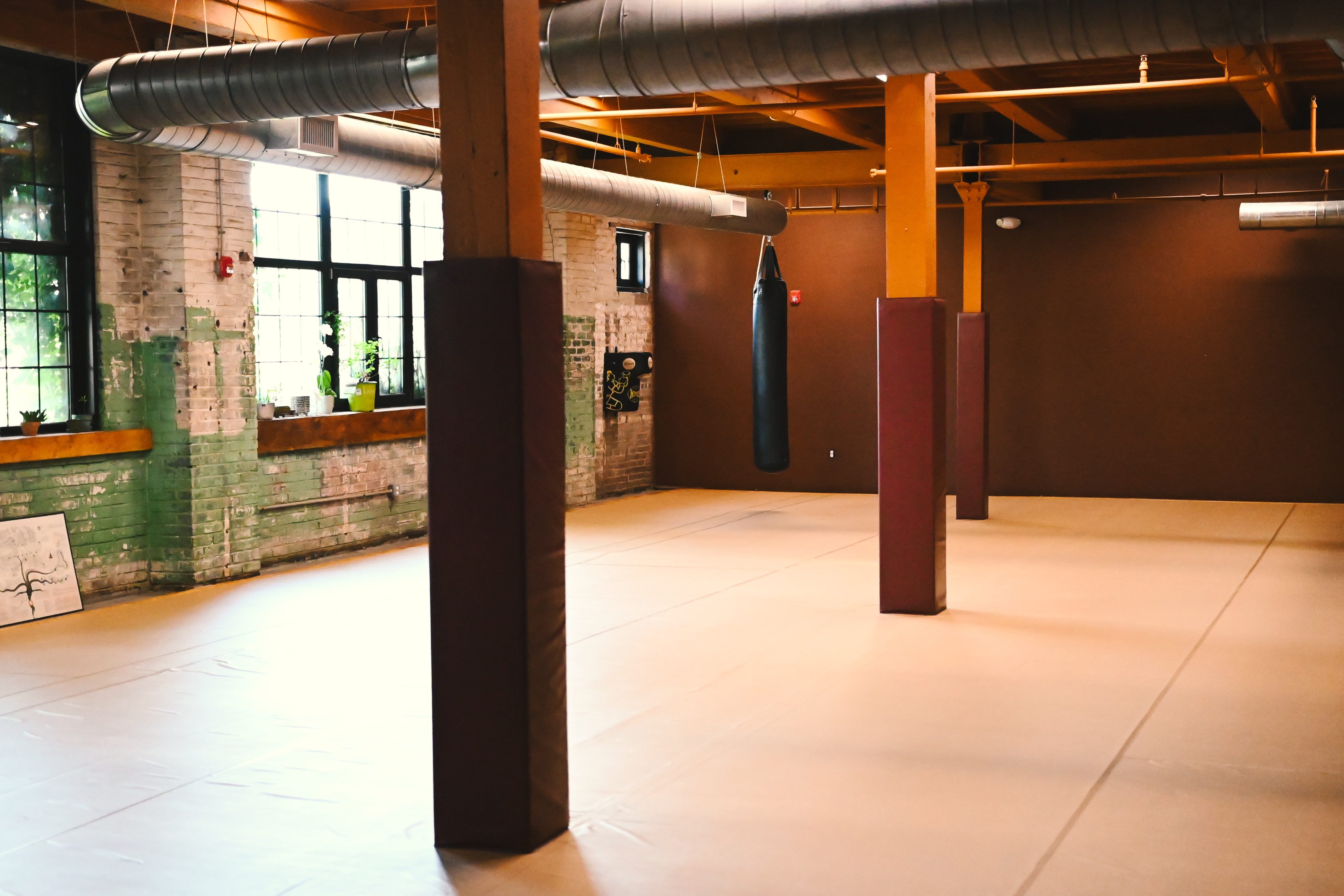 Pad work at The Garden MMA — drilling technique with Thai pads