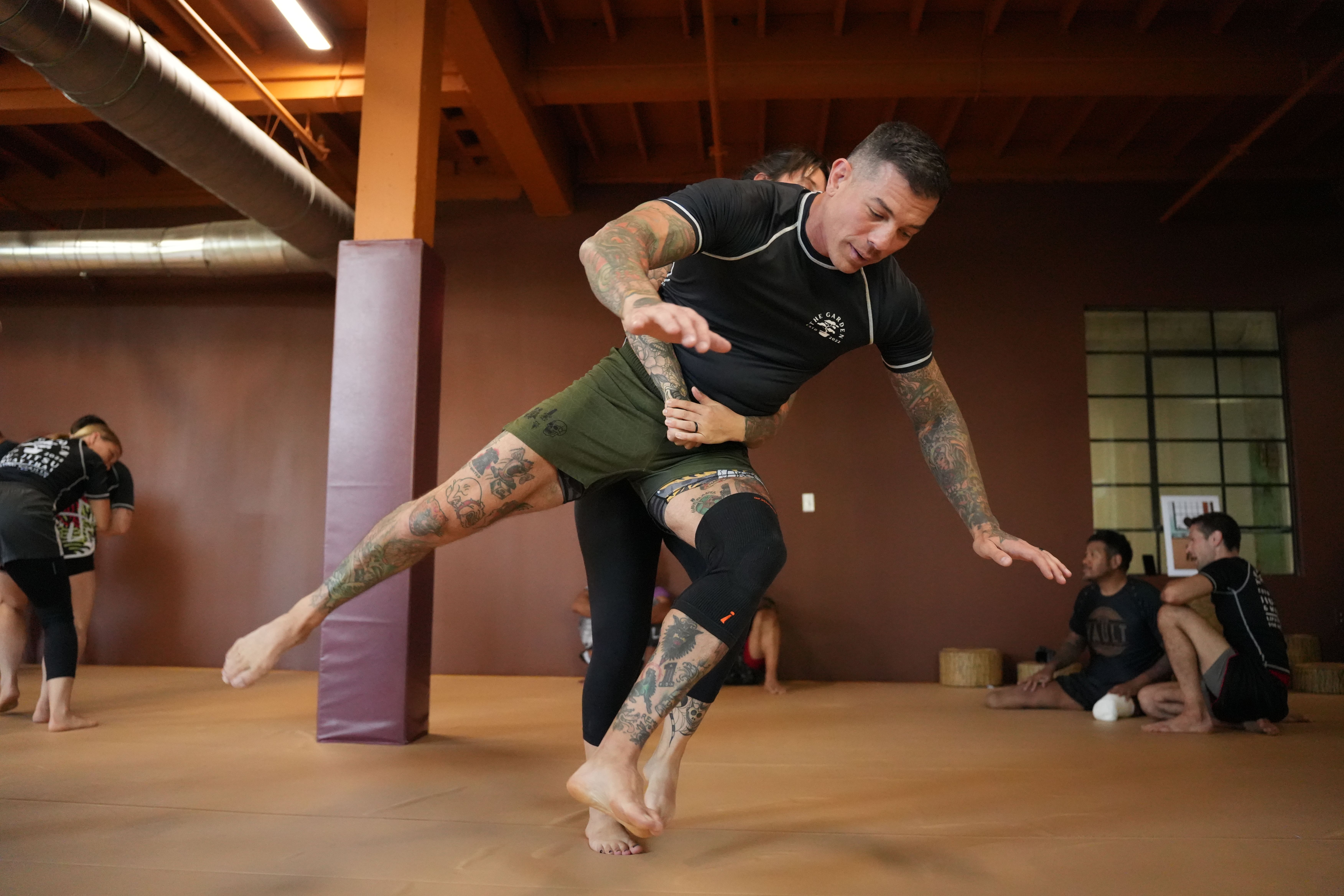 Training at The Garden MMA — clinch work on the mats